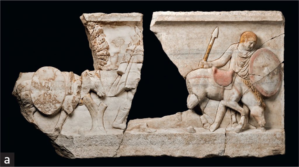 Relief block with figures and horses in outdoor landscape